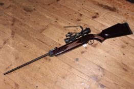 SMK .22 calibre air rifle fitted with telescopic sight.