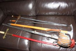 Two Wilkinson swords, dress sword with scabbard,