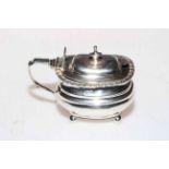 William IV silver lidded mustard pot with gadroon border and on ball feet, London 1830.