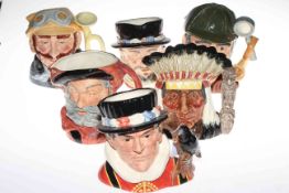 Collection of six Royal Doulton character jugs including Veteran Motorist and The Sleuth.