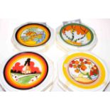 Four Wedgwood Clarice Cliff design plates.