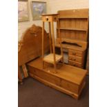 Pine four drawer dressing table, open bookcase, blanket box, headboard and plant stand (5).