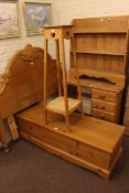 Pine four drawer dressing table, open bookcase, blanket box, headboard and plant stand (5).