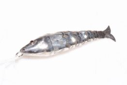 Unusual silver reticulated fish having hinged head revealing vinaigrette, 10cm length.