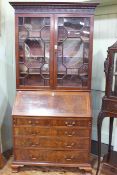 Georgian mahogany bureau bookcase having two astragal glazed panel doors above a fall front with