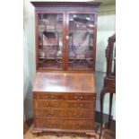 Georgian mahogany bureau bookcase having two astragal glazed panel doors above a fall front with