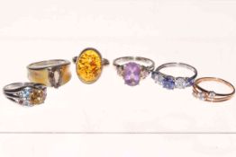 Collection of six stone set dress rings.