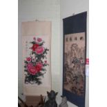 Two Chinese painted scrolls, one with original box, 190cm by 77cm and 189cm by 83cm.
