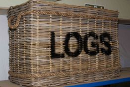 Large two handled wicker log basket, 73cm by 50cm.