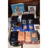 Collection of nineteen boxed Hummel figures, together with collectors book, etc.