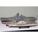 Five models of Naval war ships.