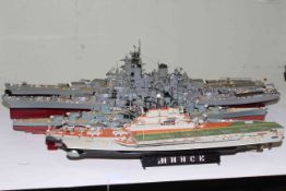 Five models of Naval war ships.