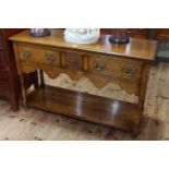 Period style oak three drawer potboard dresser, 76.5cm by 118cm.