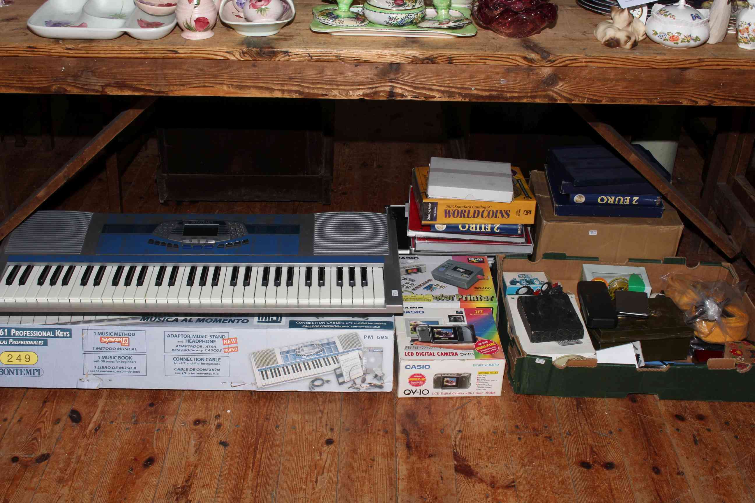 Bontempi keyboard, coin catalogue, coin packaging boxes and presentation cases, cameras,