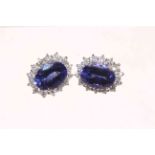 18 carat gold white gold large oval tanzanite and diamond earrings,