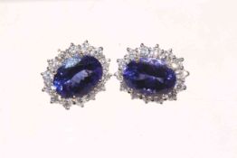 18 carat gold white gold large oval tanzanite and diamond earrings,