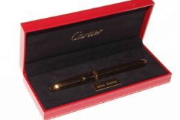 Cartier 'Serie Limitee' black and gold fountain pen, with box and papers.