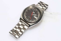 Seiko 5 stainless steel day date automatic wristwatch.