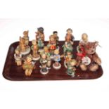 Collection of fifteen Hummel figures and Steiff teddy.