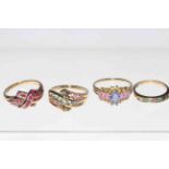 Four 9 carat gold gem set rings.