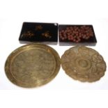 Oriental lacquered box and beads, Islamic circular dish and another with and inscription,