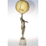 Art Deco style figural lamp modelled as lady with up-stretched arm supporting globe shade,