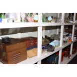 Large shelf collection of linens, collectors plates, glass, ceramics, metalwares, LP records,