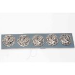 Set of five cast silver dragon buttons, Birmingham 1899.