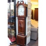 Antique mahogany eight day longcase clock having painted arched dial.