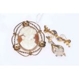 Three 9 carat gold brooches including fancy cameo.