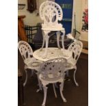 Painted aluminum circular patio table and four chairs.