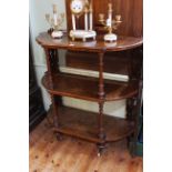 Victorian burr walnut and satinwood inlaid three tier etagé having bow ends and turned columns, 102.