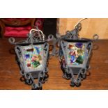 Pair of wrought iron mounted lanterns.