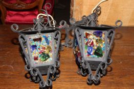 Pair of wrought iron mounted lanterns.