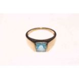 Blue topaz set 10k gold ring, size N/O.