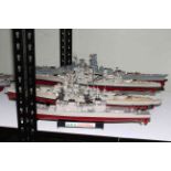 Five models of Naval war ships.