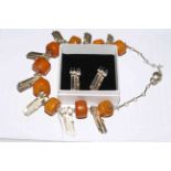 Silver and amber necklace together with en-suite earrings.