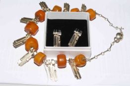 Silver and amber necklace together with en-suite earrings.