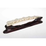 Japanese ivory bridge of five graduated lions, 36cm long.