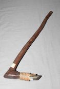 Soloman Islands adze bearing F.S. Clark collection label to stone and handle, length 59cm.