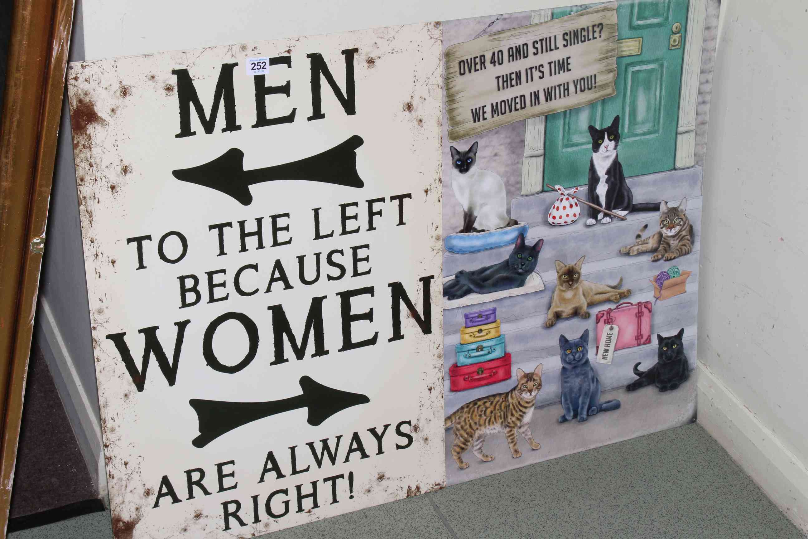 Two signs, Over 40 and Still Single and Men to the Left.