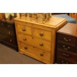 Pine chest of two short above two long drawers.