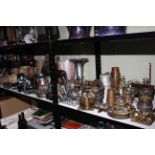 Shelf collection of stoneware, metalwares including teapot, milk churn, door stopper,