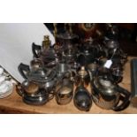 Plated tea sets, tankards, brass candlesticks, etc.