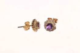 Pair of 18 carat gold amy and diamond cluster earrings in petal design.