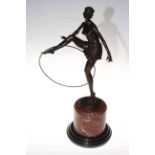 Art Deco style bronze figure of semi-clad dancing girl on marble base.