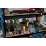 Collection of coloured and clear glassware including two coloured glass fish, clown, paperweights,