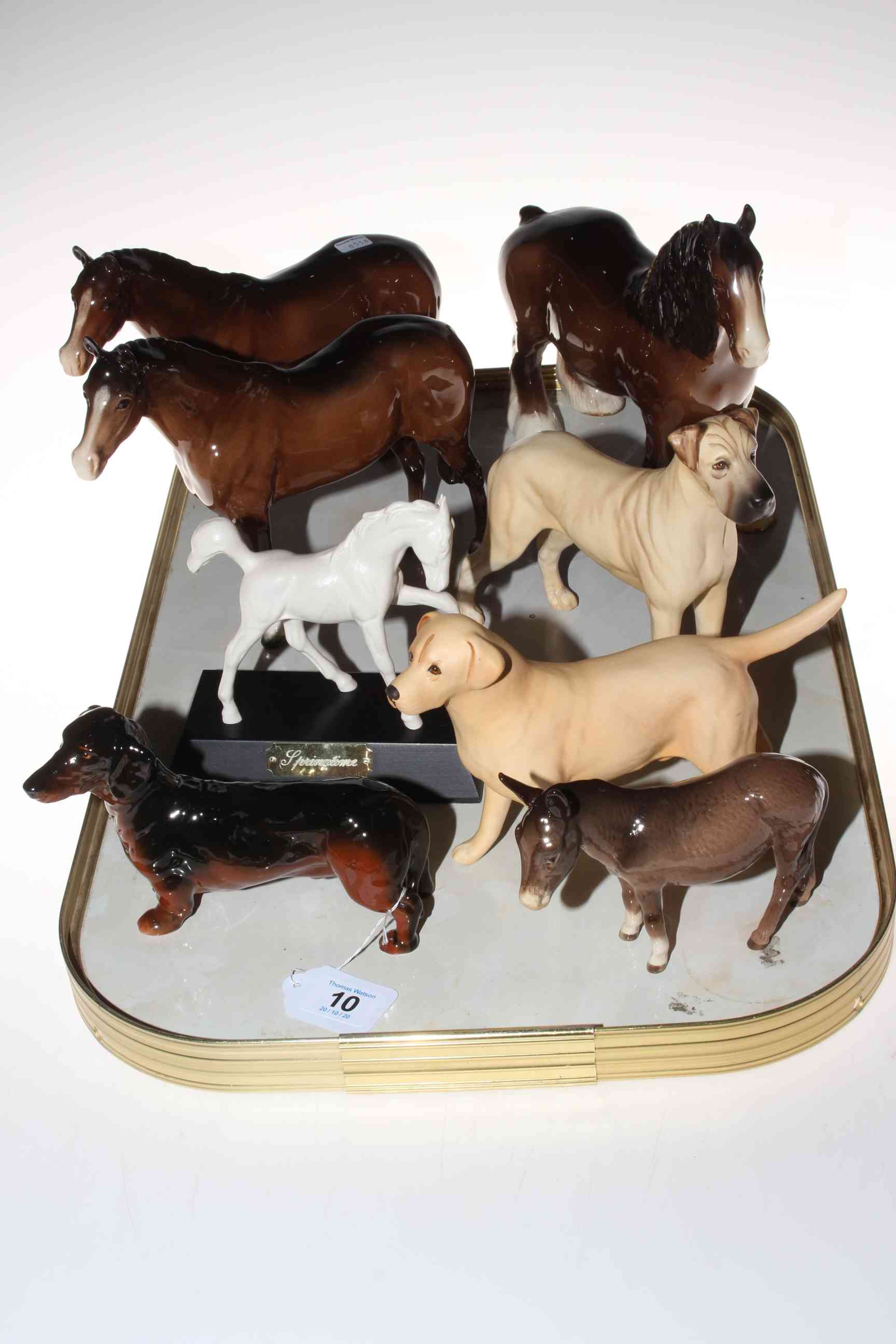 Three Beswick horses, foal, donkey and three dogs.