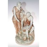 Large porcelain group of male and female water carriers in the style of Royal Dux, 57cm high.