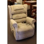Sherborne rise and fall electric reclining chair in light foliate pattern fabric.